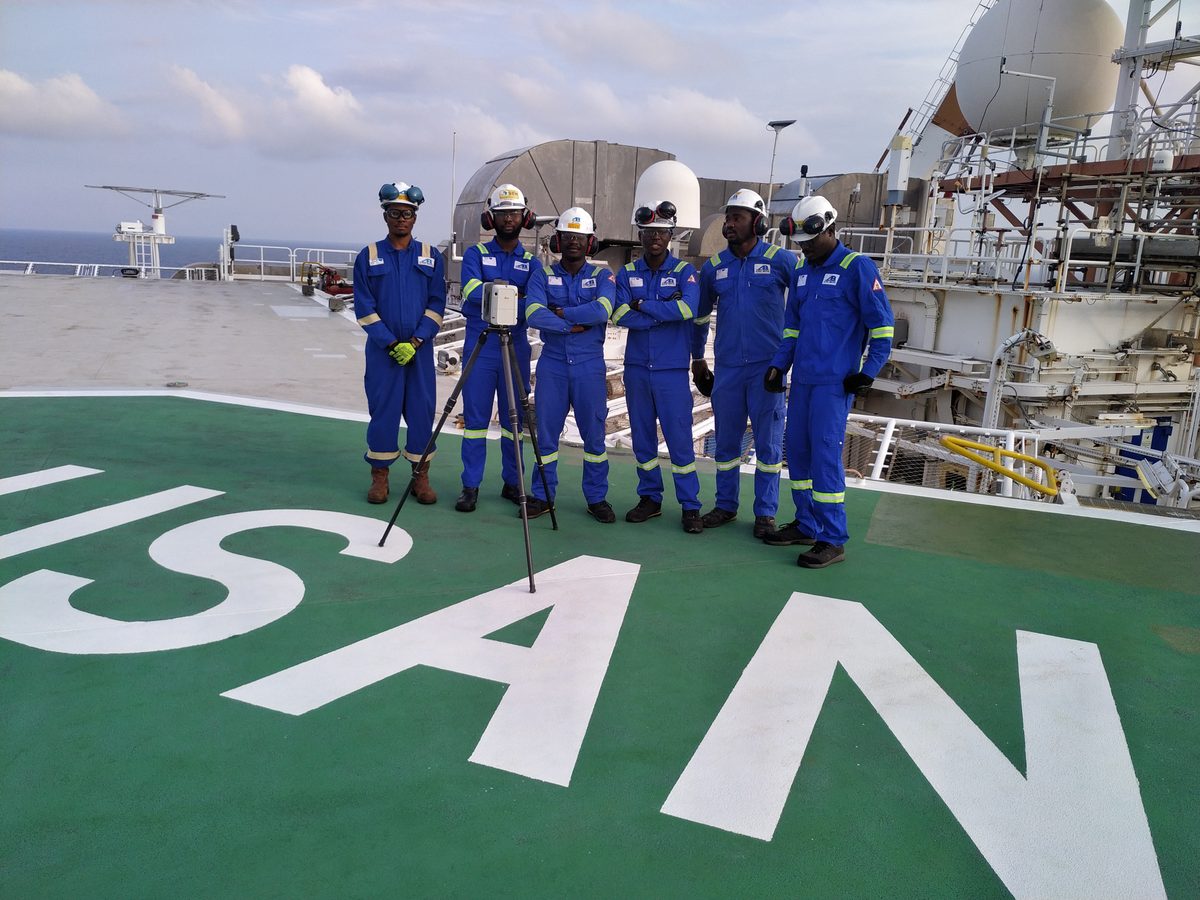 Alpha Bravo scanning team on USAN FPSO helideck with 3D laser scanner